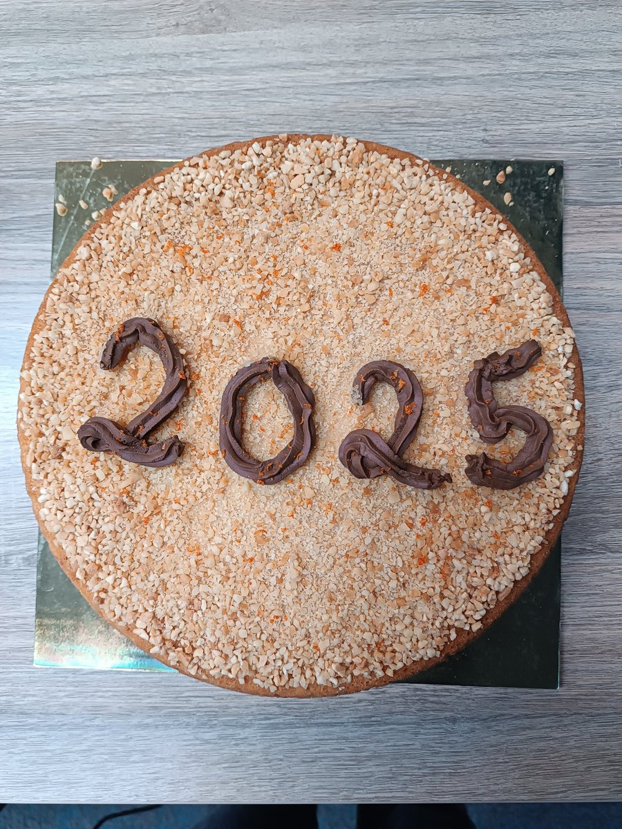 TaoufikLab's tweet photo. This year's "vasilopita" with the lucky coin going  to Theo and our precious Era's birthday. 2025 has already offered us joy and happy moments to share! https://t.co/FA5zMMHehL