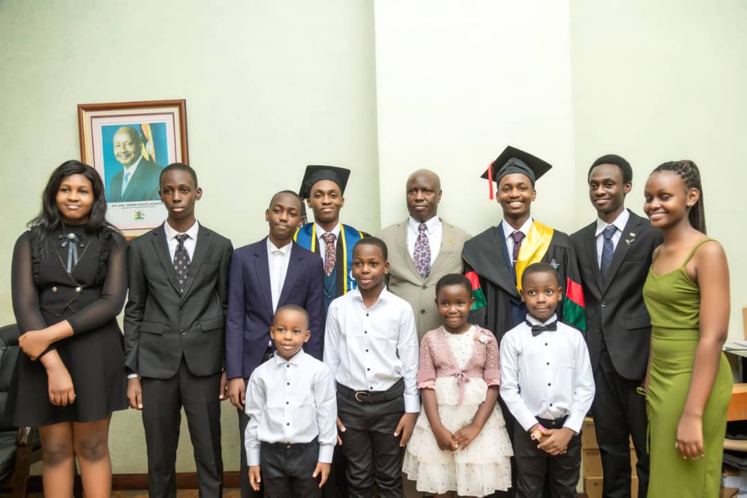 From our heartfelt wishes from us your parents Me and my lovely wife as well as your beloved Mother Ms. Kyasimiire Rhoda we congratulate you our Son's on this special achievement it's  extra special for having watched you grow up sharing amazing memories "caps off to you."
