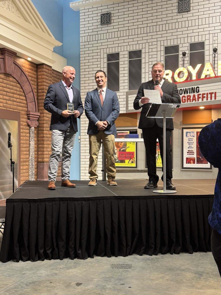 Congratulations to Justin Daale, Assistant Police Chief of the Le Mars Police Dept., on receiving the Paul Olson Outstanding Volunteer of the Year Award, during the Le Mars Chamber's Annual Dinner last night! Presenting him the award were Mark McCarty and Kyan Ludwig.