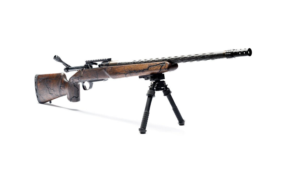 HorizonFirearms's tweet photo. The Black Tie Rifle 🪵
This truly custom 6.5 PRC rifle equipped with the Stiller Wombat action is created using walnut wood with Lichtenberg patterns. This is truly a work of art. 
#HorizonFirearms #boltactionrifle #customrifle #hunting https://t.co/CTNV8kY6Ju