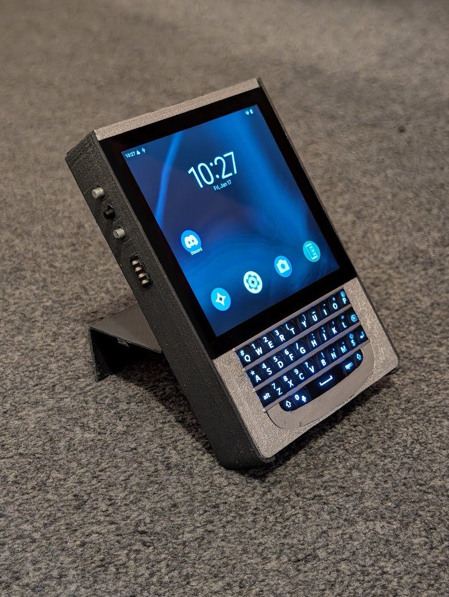 my newest cyberdeck :> uses a pi 4, 720x720 touch display and a blackberry Q10 keyboard! the battery hatch also doubles as a kickstand, and the side buttons and dip switches are completely reprogrammable with the RP2040 inside