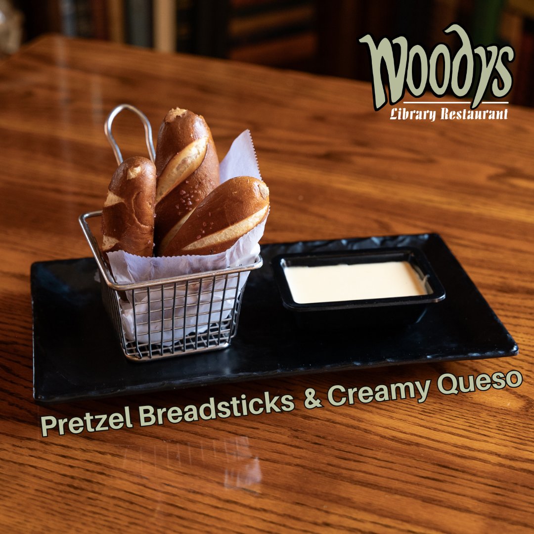 Start your meal off right with our pretzel breadsticks served with creamy queso. These warm, soft breadsticks are the perfect balance of salty and savory, and the rich queso makes every bite irresistible. It’s the ideal appetizer to share with friends or enjoy on your own.
