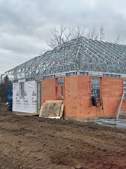 FSPArchitects1's tweet image. 🏗️ Progress at Christ Child House! The residential wing is taking shape with slab, steel, and roof trusses complete. The gym is enclosed with an acoustic deck, roof membrane, and temp heat to keep work on track this winter. Stay tuned for more updates as we make progress! ✨