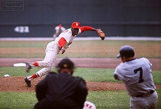Bob Gibson pitching against Mickey Mantle in the 1964 World Series Game 2, October 8, 1964. Photo by Walter Iooss Jr. Gibson was the MVP of the Series. In Game 7 of the series Mickey Mantle hit his final World Series home run off Gibson. Mantle still holds the record for World