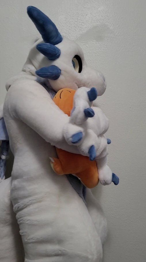 Keeping warm with my Pokemon buddy #FursuitFriday