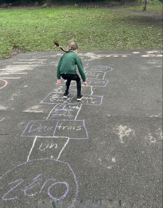 Y5 and Y6 have been enjoying creating their own hopscotch games on the playground in French - what a great way to practise!