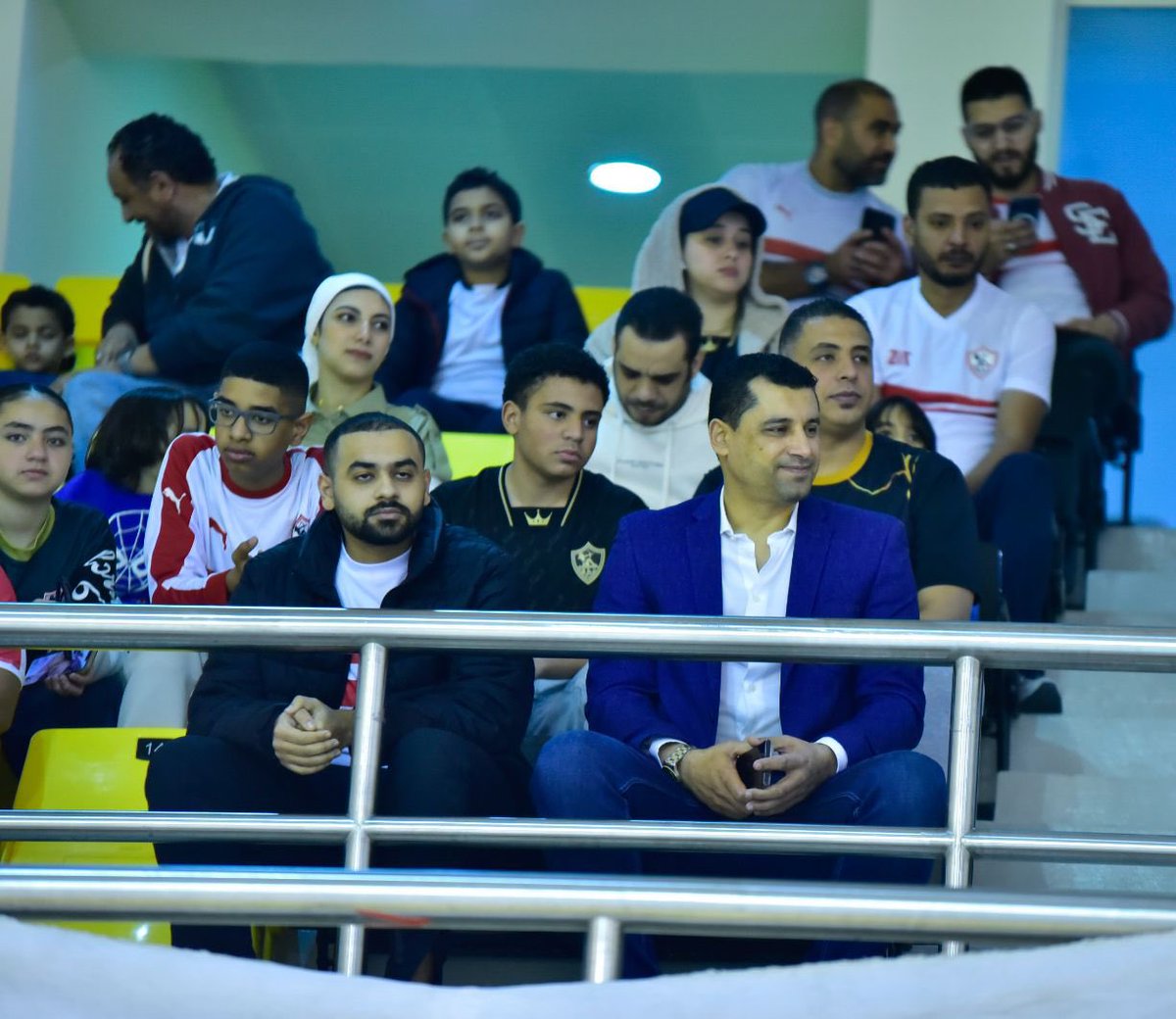 SpikesAhmed's tweet photo. صورة لتواجد الكابتن هيثم فاروق، الرئيس الشرفي للرابطة، في مباراة الزمالك والسيب العماني ضمن البطولة العربية لكرة الطائرة.

بصراحة، كابتن هيثم نموذج حقيقي للمشجع الزمالكاوي قولًا وفعلًا.
صوت الزمالك في الإعلام 🎙️ ودائمًا داعم لأي حدث زمالكاوي في الدوحة. 🙌❤️@HaythamFarouk https://t.co/AgHixQBoLW