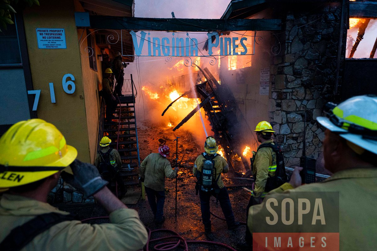 sopaimages's tweet photo. Several views of #LongBeachFD #Firefighters #hosedown a #burning #apartment #building in #Altadena, #UnitedStates on Jan 8, 2025. The #EatonFire in #Altadena has prompted the #evacuation of over 100,000 residents and claimed five lives. ๐ท Jon Putman for SOPA Images https://t.co/g95TzkLcdk