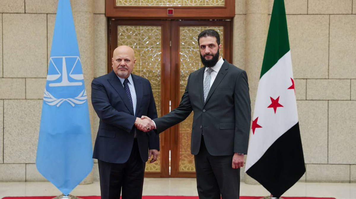 HenMazzig's tweet photo. The ICC prosecutor, Karim Khan, issued arrest warrants against Israeli leaders—then traveled to meet al-Julani, Syria’s new leader and former al-Qaeda commander. 

Not to issue an arrest warrant, but to greet him and take a picture together. 

Shameful. https://t.co/NT1yWMen0N