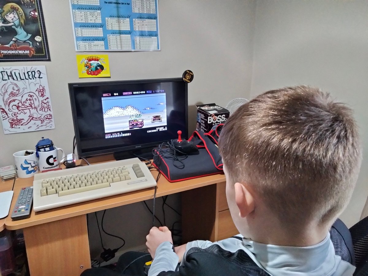 Two Grandsons staying over tonight. Room with an N64, Dreamcast, Playstation's and XBox's. What did they choose? My game 'Spheroid' on #Amiga and the latest build of #Outrun #PETSCII on #C64! Good choices! <a href="/C64Reposts/">C64 Reposts</a> <a href="/EverythingC64/">Everything C64</a> <a href="/AmigaReposts/">Amiga Reposts</a>