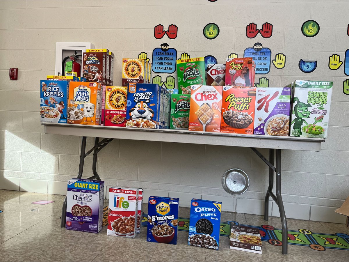 GBCSBobcats's tweet photo. Indian Hill students &amp; staff dressed in Lions gear and collected cereal to support Fish of Grand Blanc this week! Nearly 500 boxes of cereal later, the winning grade won blue Lions cupcakes and a blue Kool-Aid! Great job seeing a need in the community and stepping up! #WeAreGB https://t.co/mDJUeY6BLm