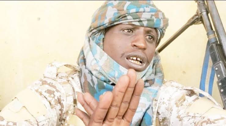 ZagazOlaMakama's tweet photo. Notorious Bandit Leader Bello Turji on the run as Military dislodged camp, killed his son

By: Zagazola Makama 

Combined ground and air troops under Operation Fansan Yanma have escalated their offensive against the notorious bandit leader Bello Turji in Zamfara State. Recent coordinated military strikes have dismantled key hideouts in Fakai, a stronghold in Shinkafi Local Government Area, where Turji and his associates have long operated.

This comes after a series of successful missions that resulted in the destruction of multiple bandit camps in the Sabon Birni Local Government Area of Zamfara State.

Among the camps targeted were Zangon Dan Gwandi, Zangon Tsaika, Zangon Kagara, and a school reportedly used by Turji to store foodstuffs and weapons. The military burned the school to prevent it from serving as a supply base for Turji’s network.

Intelligence sources comfirmed to Zagazola Makama  that Turji’s group has suffered significant losses. “We killed his son and many of his fighters during the operation. I also listened to Turji’s panicked voice calling for reinforcements from seven other bandit leaders. None of them showed up, and one of his spies narrowly escaped from us today,” the sources said.

A considerable number of Turji’s associates, including high profile lieutenants and possibly family members, were neutralized during the targeted strikes.

Further reports reveal that four of Turji’s fighters were injured in previous encounters, while others have retreated to Mangwarorin Gebe, allegedly hiding stolen livestock and valuables.

The operation, described as strategic and carefully planned, is primarily led by a special forces with support from the General Officer Commanding (GOC). The special forces are supplemented by personnel from the Navy’s Special Boat Service (SBS), provided by the Theatre Command.

This operation is one of the most decisive efforts in recent times.Our forces are committed to ending the impunity of notorious bandits. This is a sustained campaign to dismantle these networks completely.”

Recent military successes have been attributed to proactive intelligence sharing and early warning systems, which facilitated the evacuation of civilians from high risk areas, thereby reducing collateral damage. The Nigerian Air Force executed a series of precise airstrikes, dismantling crucial hideouts and significantly undermining Turji’s operational capabilities.

Elite troops from Operation Hadarin Daji and the special forces unit of Operation Fansan Yamma have strategically positioned themselves along key escape routes.

Credible intelligence indicates that Turji was last sighted at Zangon Gebe, where he remains surrounded by his heavily armed fighters.

More details