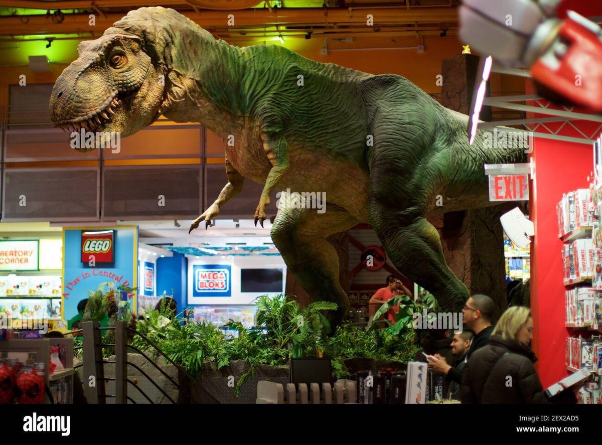 Sketchy_raptor's tweet photo. It appears to be identical to the famous Jurassic Park T. rex  that used to reside in the Times Square Toys R Us. A source quoted in the Wall Street Journal claims it was "shredded and burned" after the store closed in 2016. But here it is, currently in a Creatonist Museum? (2/3) https://t.co/1H9jQQQGP9