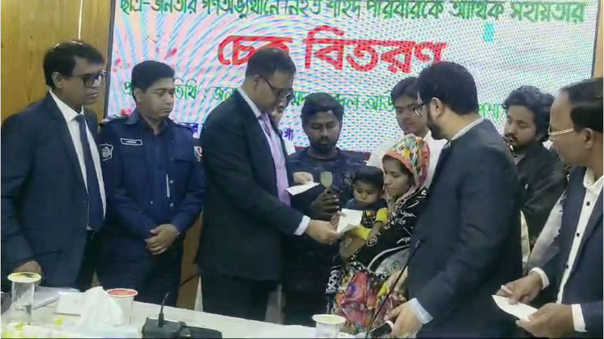 নওগাঁয় গণঅভ্যুত্থানে শহীদদের পরিবার পেলেন আর্থিক সহায়তা