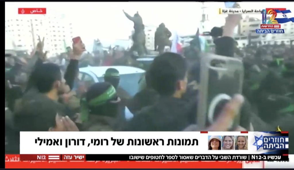 EylonALevy's tweet photo. Hamas is forcing the hostages to walk through a crowd of jeering innocent civilians, like something from Game of Thrones. Terrorizing them till the bitter end. https://t.co/y755deq1H0