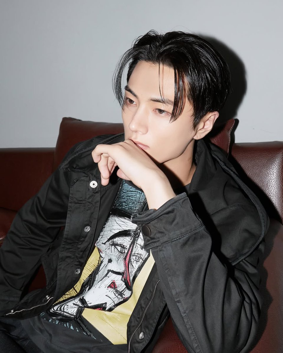 Sitting on my brown leather couch, I'm lost in thought, wearing my favorite black jacket over a graphic tee. The clock ticks away, reminding me it's late, but my mind is elsewhere, pondering the mysteries of the night.