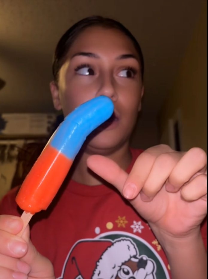 tiktok is back on and thank heavens we didn't lose this national treasure... i go to the website, and this is the first video that comes up.. this chick doing sexually suggestive things with a "gummy popsicle"