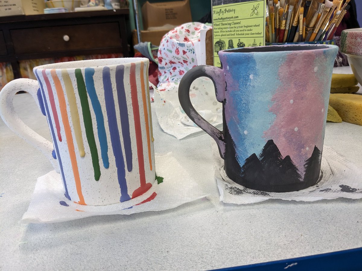 Painted mugs today. Cannot wait to see them all glazed and colorful in 2 weeks!