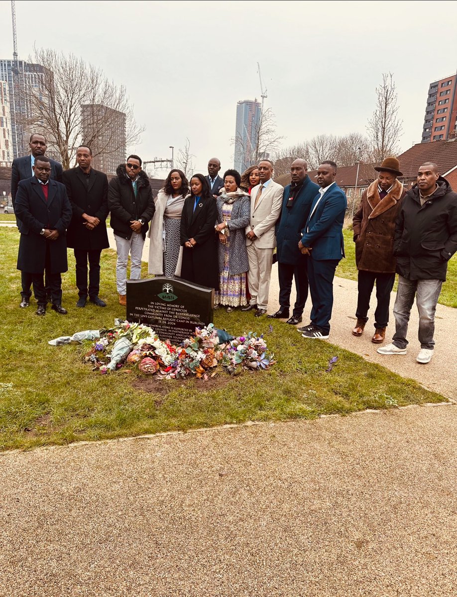 A poignant symbol of remembrance, this newly unveiled memorial in Salford, Manchester, pays tribute to the Banyamulenge victims of the 2004 Gatumba Genocide. The stone stands as a solemn reminder of the innocent civilians who were brutally murdered in a refugee camp, ensuring