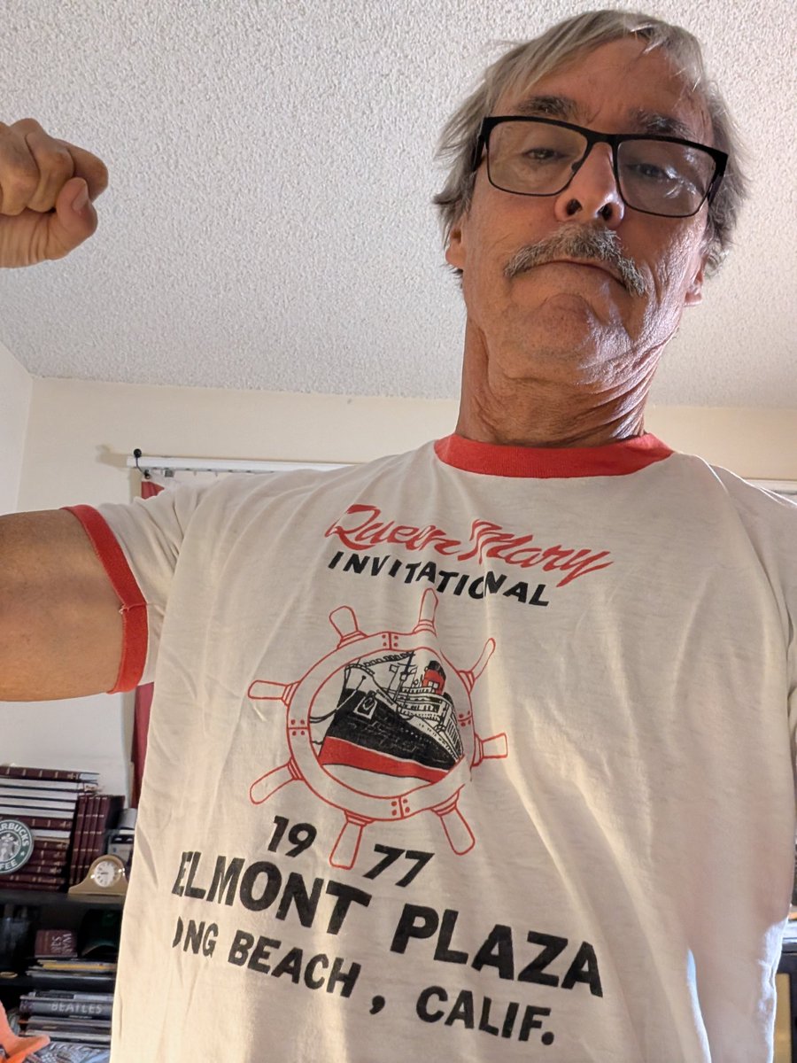 georgesy_09010's tweet photo. So flash from the past, wearing my Dad's vintage 79 year old sweater and under the sweater I am wearing my 1977 swim t-shirt #SGSGGOLD #vintageclothes #oldschool https://t.co/NP0LIr4j5J