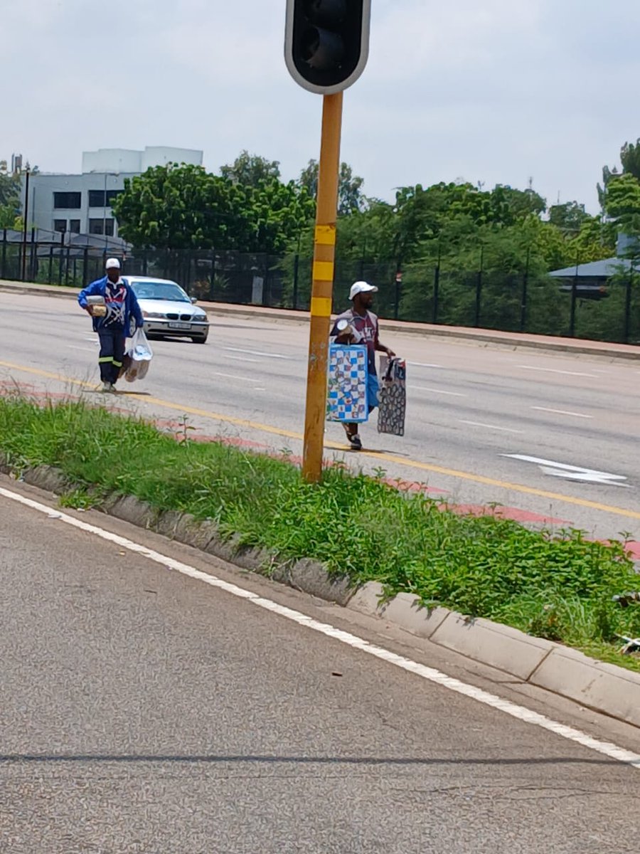 nasiphim's tweet photo. One by one 🙏. The @TMPDSafety has begun addressing the long-standing issue of illegal use of our intersections, including tackling women who exploit children for begging and other illicit activities. Happy and productive week, Jacaranda City ❤️ @CityTshwane https://t.co/411HIcLV4v