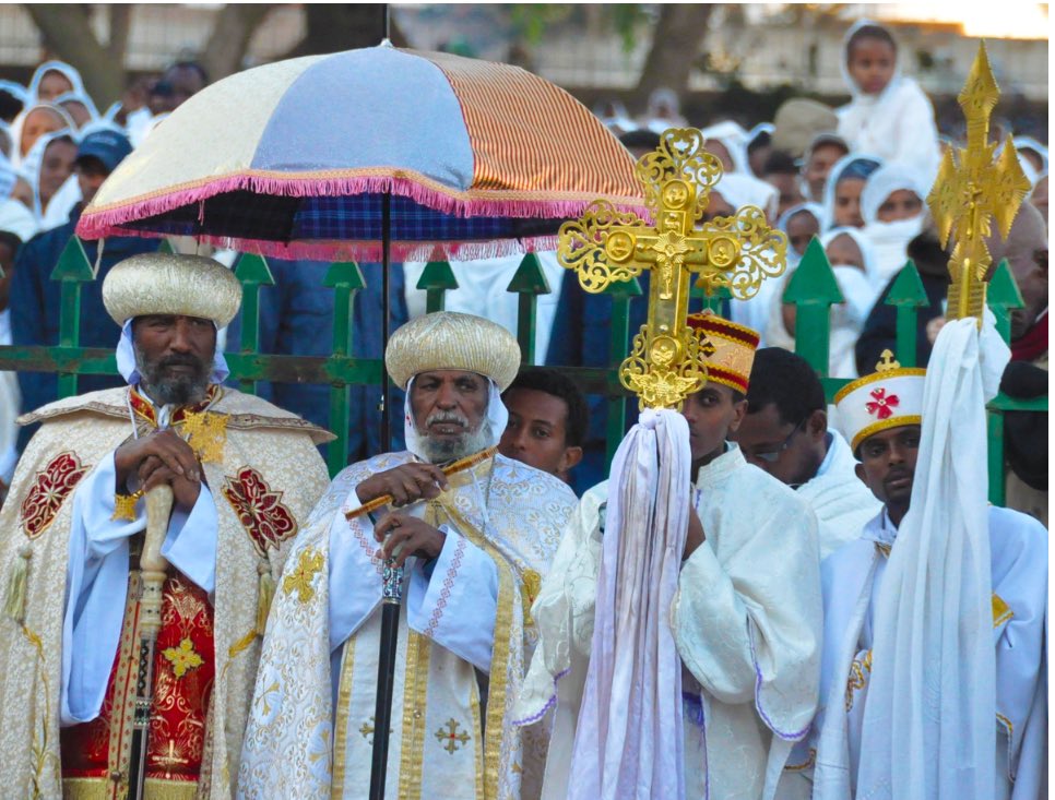Fundji3's tweet photo. #Ethiopia / Let me tell you about the Ethiopian Epiphany #Timkat (or Timket) that marks the baptism of Jesus in the River Jordan and is considered one of the most important religious festivals in Ethiopia and is registered as an intangible cultural heritage by UNESCO.
Taking place in Ethiopia every year on 19thJanuary (or the 20th on leap years!) Timkat(also known as Timket) is an Orthodox Christian celebration of the Ethiopian Epiphany. It celebrates the baptism of Jesus Christ in the Jordan River and is best known for its ritual re-enactment of the baptism.
All over the country large crowds gather, with pilgrims coming from all over to witness the re-enactment, and take part in the festival, which lasts three days. At its most vibrant in Addis Ababa (the capital), everyone gets involved in the celebrations, which include processions, songs, dance and prayer.
Starting with Ketera (preparations) the day before, the festival then goes on to last for three days. On the first day, models of the Ark of the Covenant, called Tabots, are carried to the river in a procession led by the most senior priest of each church. The priests carry the arks on the top of their heads and, at dawn, the water is blessed and sprinkled on the participants. Some participants jump into the water to renew their baptism vows.
The second day marks the main celebrations when Orthodox Ethiopians march through the streets decorated with green, red and yellow to represent the Ethiopian flag. There is lots singing, dancing and feasting, as all but one of the Tabots are returned to their individual churches.
The third, and final, day of Timkat is known as the feast of St. Michael the Archangel, when the Tabot of St. Michael’s Church is returned, accompanied by a procession of priests and believers.