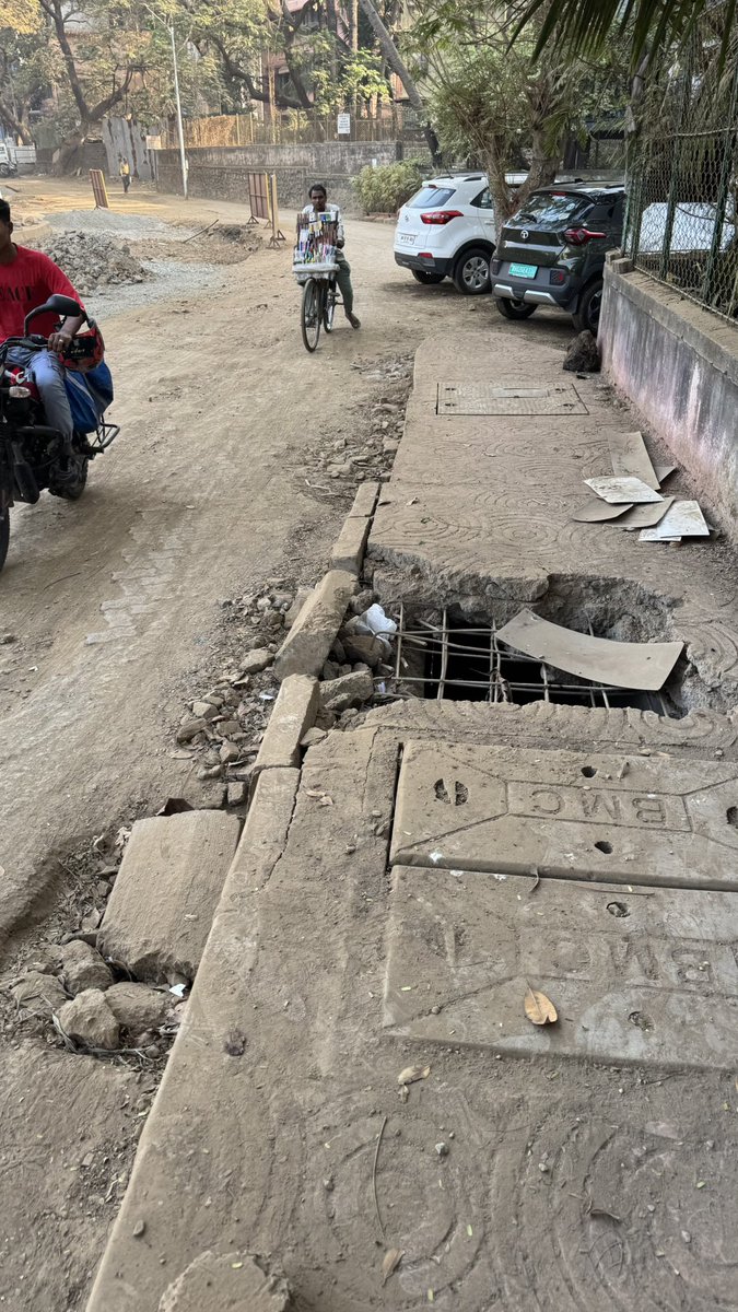 Stupidity or a scam ? 
This foot path was build freshly 4 months ago. Then they dug up the entire road, destroyed the footpath. Now once the road will be ready a new footpath tender will be issued. That will destroy the fresh road. सोन्याची अंडी देणारी कोंबडी. #mumbai #bmc