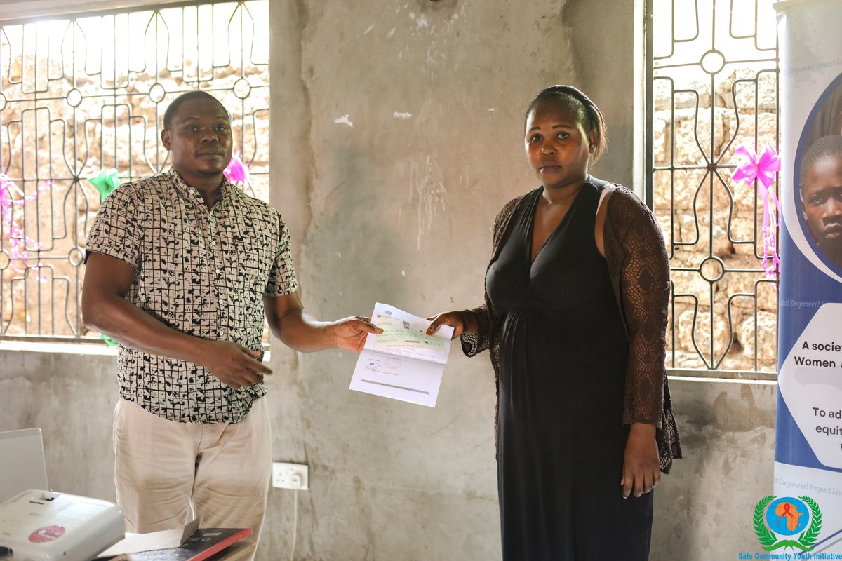 safecommunity4's tweet photo. One way of transforming the lives of girls & young women is by supporting them to access education. we had an opportunity of issuing cheques to support school fees for #GYW under our education program we also had discussion with parents about the academic progress of our girls. https://t.co/Pke3pmkXQT