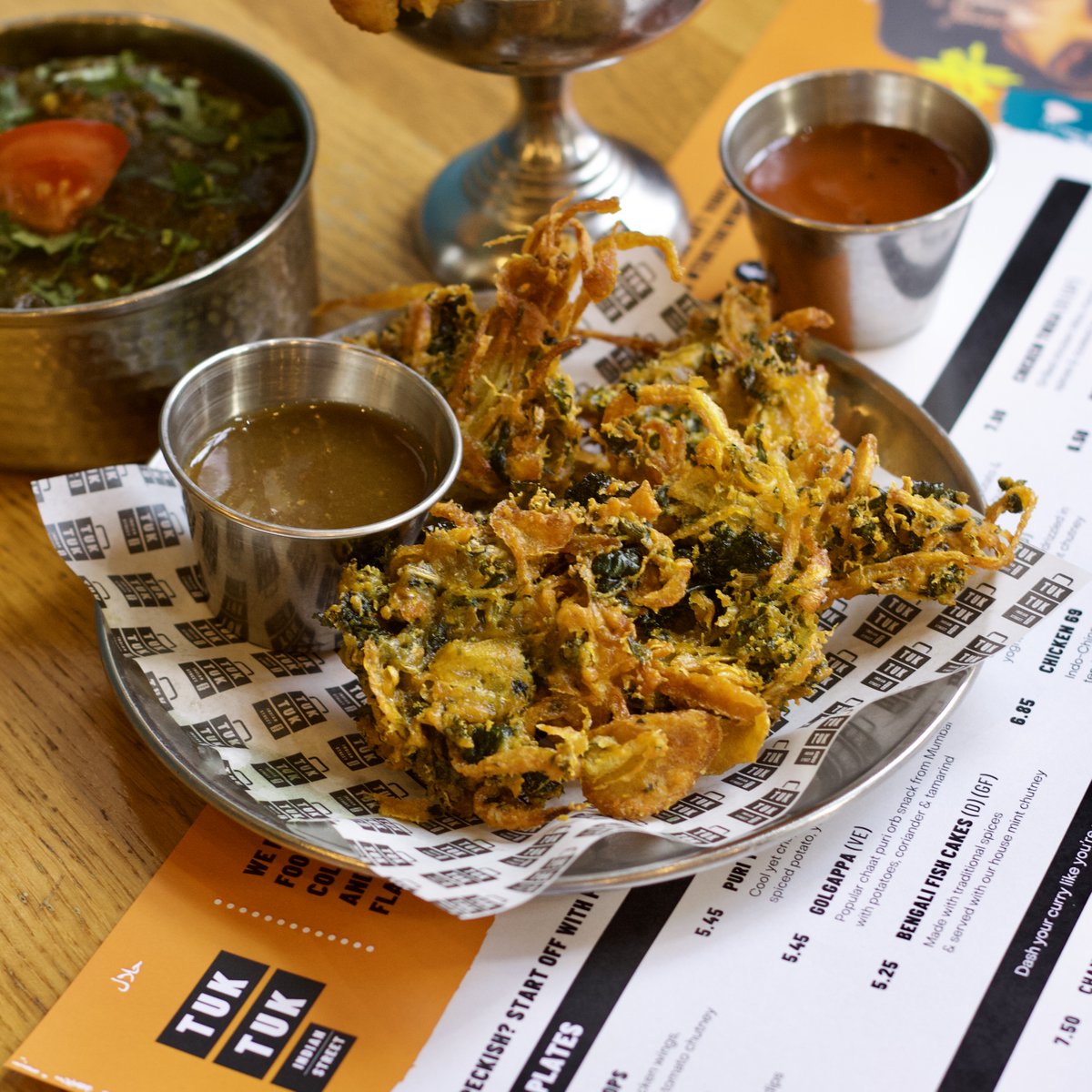 KALE BHAJI

Crunchy kale onion bhajis, always golden, served with dips