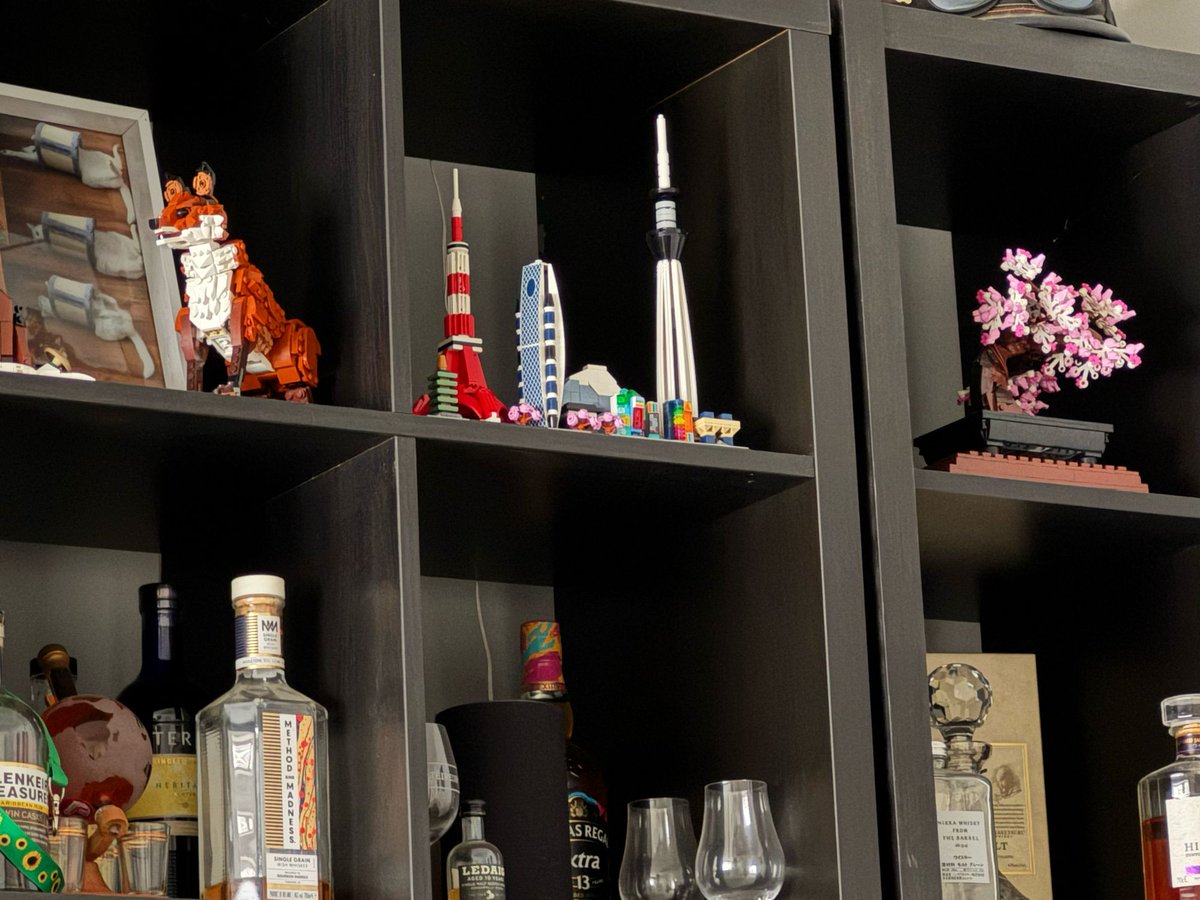 Pensinuf's tweet photo. The Lego has taken its rightful place upon the Lego/whiskey shelves https://t.co/TX0HqBYwI1