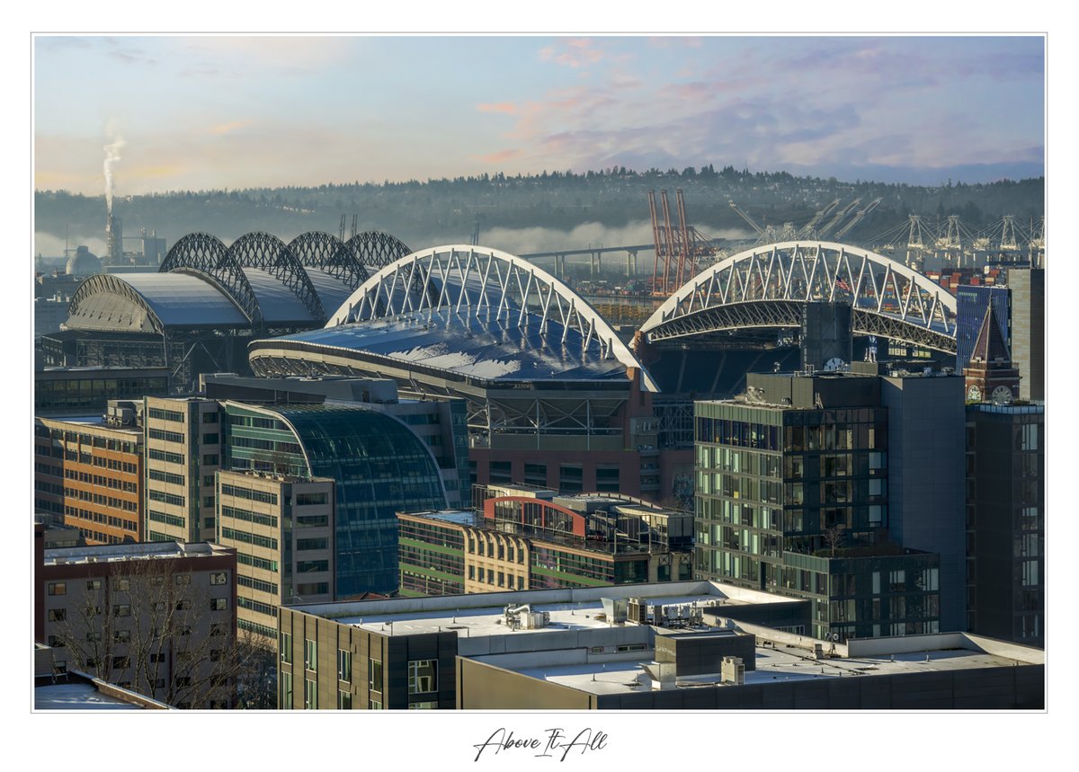 Above it all by Louis Ruth Photography
This photo captures a rooftop view of Seattle and its iconic stadiums at sunrise as clouds settle on the water.
-
LouisRuthPhotography.com

#Seattle #seattlearchitecture #urban #louisruthphotography #cityscape #displate #lumenstadium #tmobile