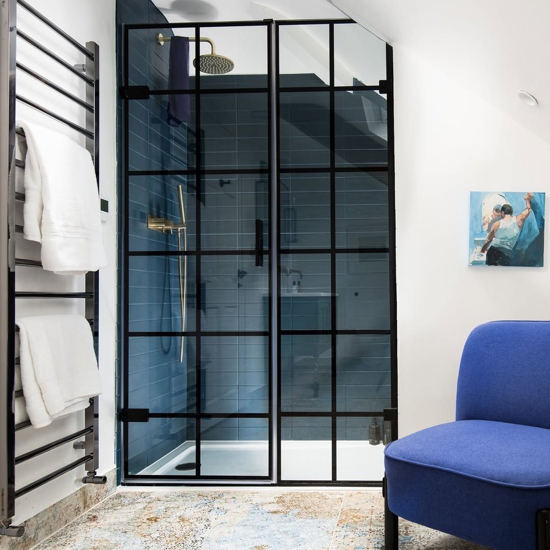 BLUE MONDAY

🟦 We're obsessed with this bathroom’s rich, luxurious blue tiles that radiate personality and sophistication. The Liberty shower screen, with its clean lines and industrial chic vibe, transforms this compact space into a calming oasis to banish those Monday blues.
