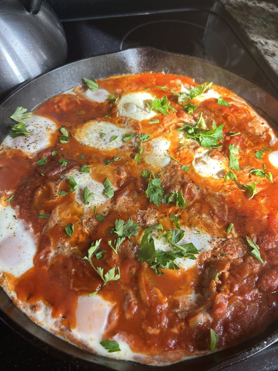 lasherdani's tweet image. I didn’t coordinate my brunch plan with Inauguration Day, but the irony of these eggs in purgatory isn’t lost on me. 🫠 #bonappetit #GodBlessAmerica #Trump