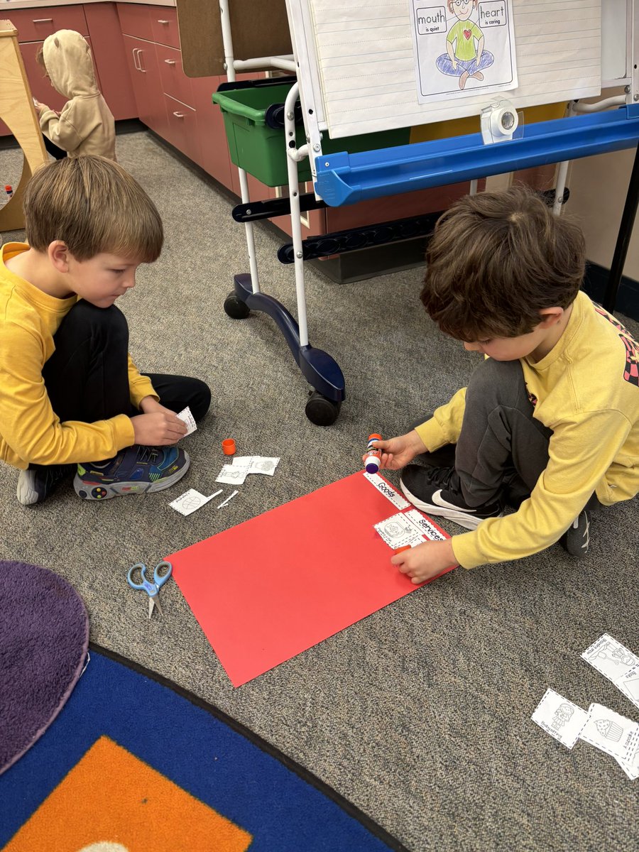 Working with a pal to think about the difference between goods and services! #kindergartensocialstudies