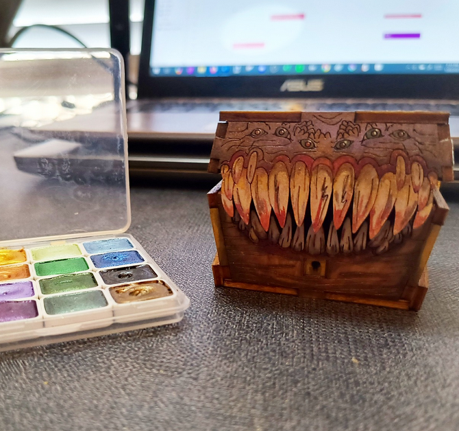 catghoststories's tweet photo. A lil' #mimic chest I painted - the original #woodwork is from CZYY! It was a lot of fun to paint 🔥🎨

#dnd #modelkits #wood #woodwork #paintingminiatures #dndart #dungeonsanddragons #miniatures #paint #painter #artistsontwitter #art #artsandcrafts #ArtistOnTwitter #artworks https://t.co/VhwPXrDTGZ