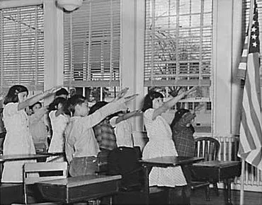 snarkyslang's tweet photo. The Roman salute, which is also known as the Fascist salute, gained historical significance in the United States due to its association with the Pledge of Allegiance and the Bellamy salute. The Bellamy salute, created by James B. Upham and promoted by Francis Bellamy, was first demonstrated on October 21, 1892, as part of the “National School Celebration of Columbus Day.” This salute involved raising the right hand, palm downward, to align with the forehead and close to it, as the pledge was recited.

This was STANDARD in America and means loyalty
This WAS our Pledge of Allegiance. No one gets to erase or debase OUR history.