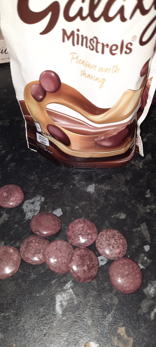 tamisara's tweet photo. @GalaxyChocolate I've just opened a bag of Minstrels and they have a strange mottling and texture https://t.co/n5wcL1UB7t