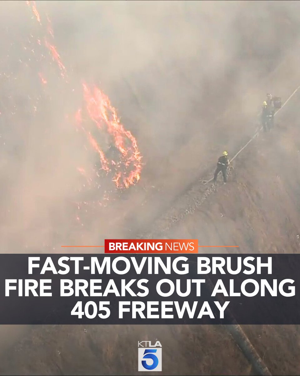 KTLA's tweet photo. #BREAKING: Fire crews are battling a brush fire along the 405 Freeway in the San Fernando Valley. Live coverage: https://t.co/f5mVsgid2d https://t.co/FzRfckBjQP