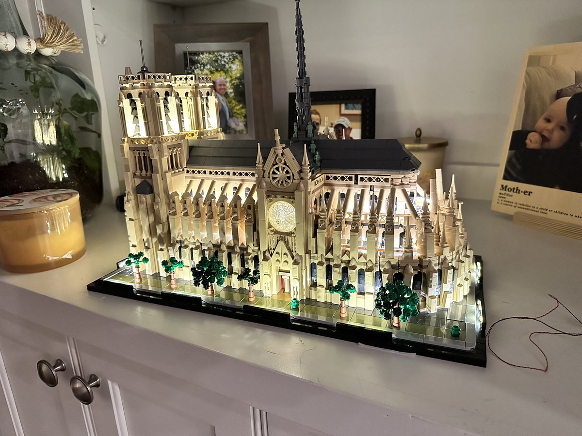 MilesTMitchell's tweet photo. In honor of their national championship appearance, here is my Notre Dame cathedral build.  Finished it while the power went out.  Added light too! https://t.co/mA2nBoKXZk