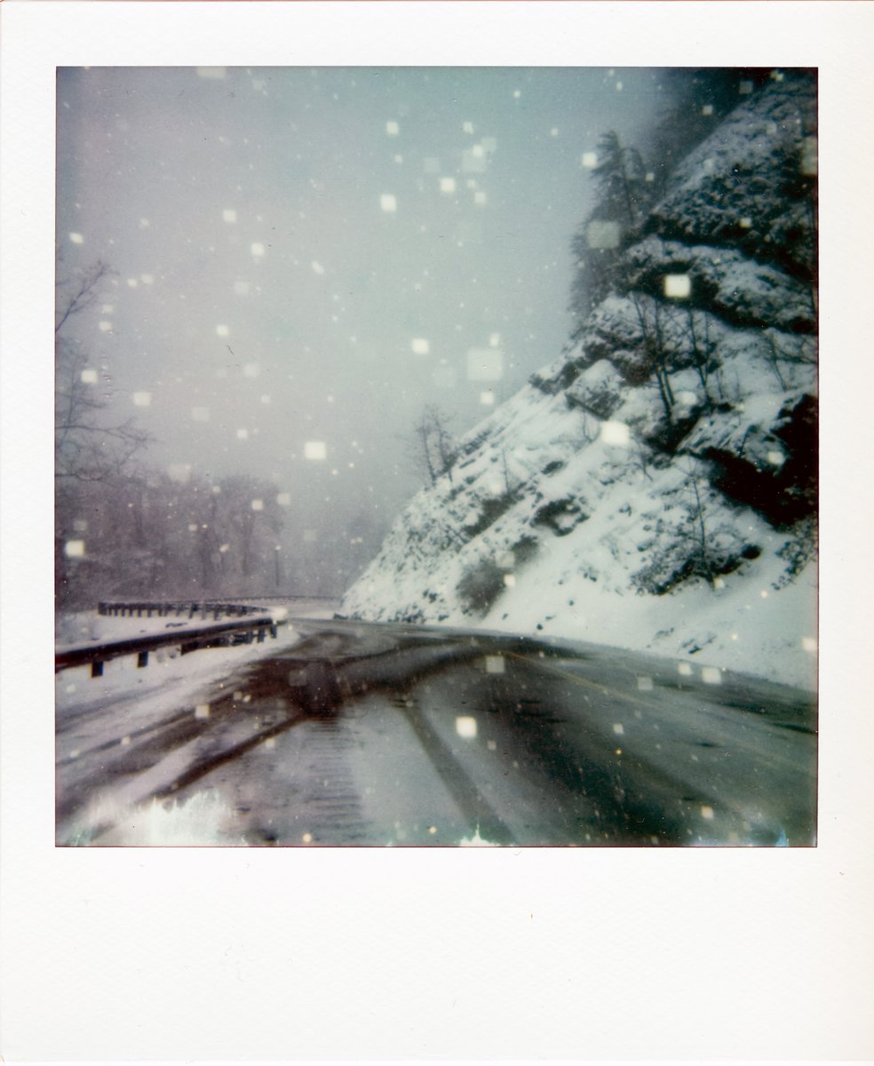 CrisRitchiePics's tweet image. A snowy day in Eastern Kentucky with an old Polaroid.