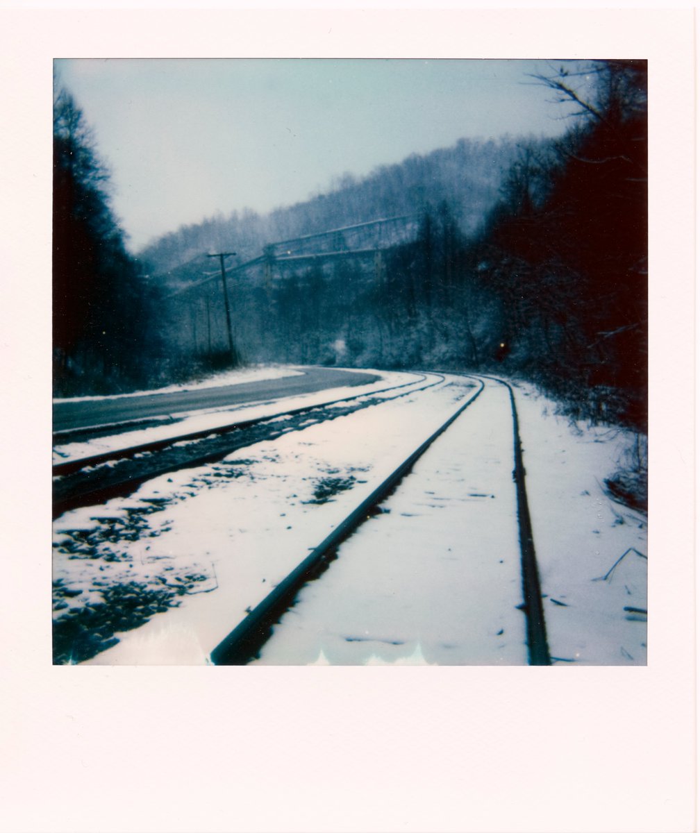 CrisRitchiePics's tweet image. A snowy day in Eastern Kentucky with an old Polaroid.