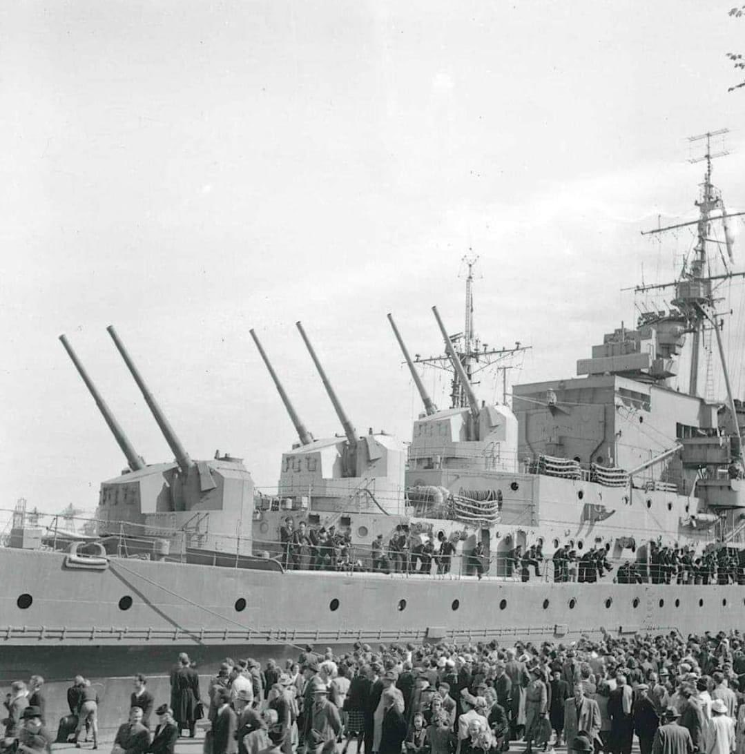 The light cruiser HMS Dido at Copenhagen, 9 May 1945. In my humble opinion,the Dido Class light cruisers were the most Elegant, and graceful cruisers of WW 2. They Embodied speed, power, and grace in a sleek design and were well armed.