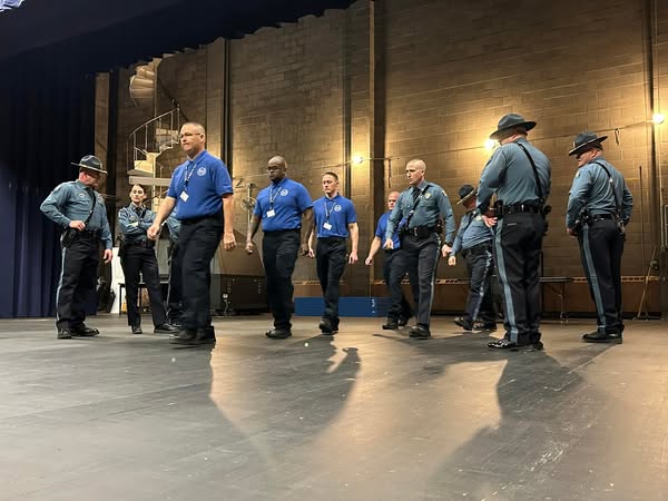 kshighwaypatrol's tweet photo. Class 72 day 1! Recruit uniforms and PT gear are issued. A few pushups in center hall, and they’re learning drill and ceremony.
#ServiceCourtesyProtection
#KHPClass72 https://t.co/VMmBSIb4ts