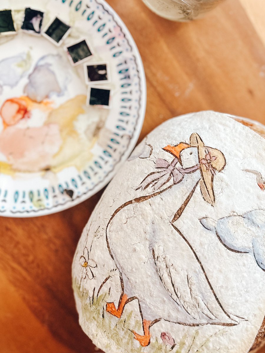 LoafFiBread's tweet photo. Goose bread I made last May
 the “paint” is natural food coloring in watercolor pans
I used beta carotene, cocoa powder, cabbage powder, matcha, and blue butterfly pea flower
#goose #sourdoughbreadart https://t.co/m0dKFT2Z9H