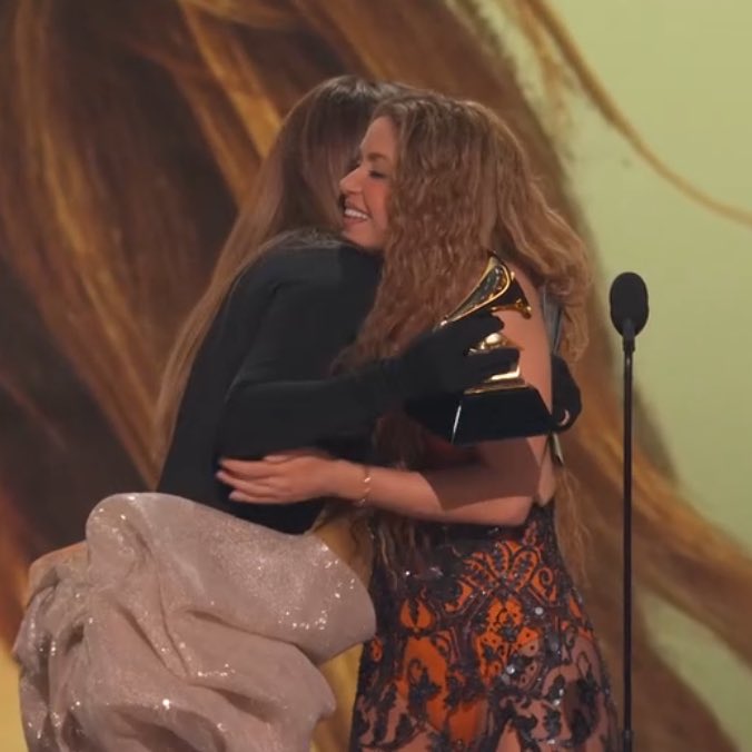 PopBase's tweet photo. Jennifer Lopez presents Shakira with the #GRAMMYs award for Best Latin Pop Album. https://t.co/xeZ0KOp1mi