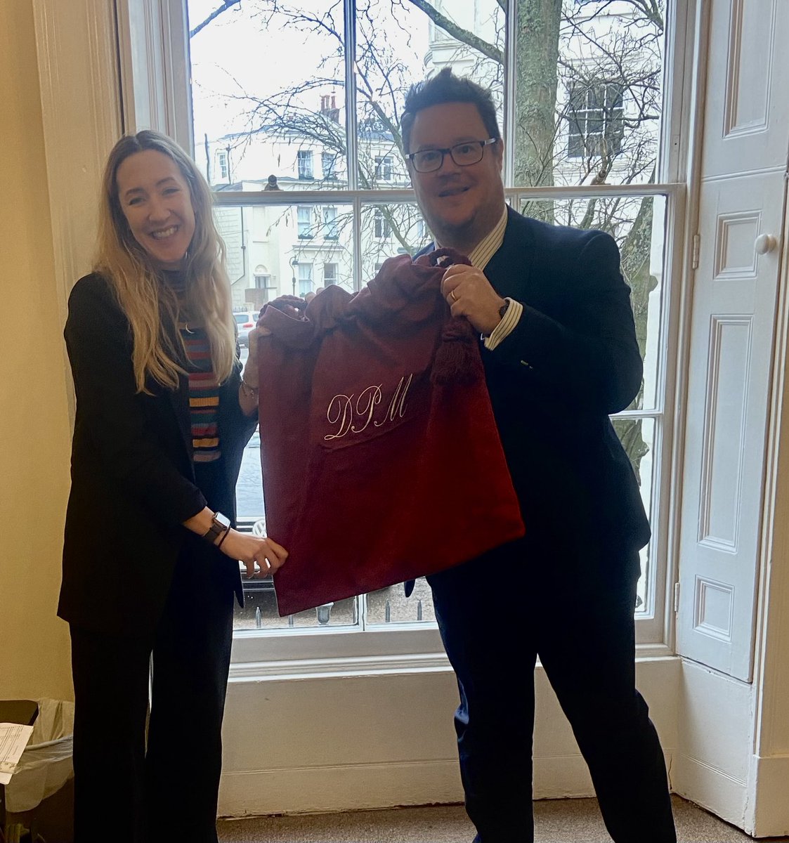 Proud moment as Duncan Milne gets his red bag!