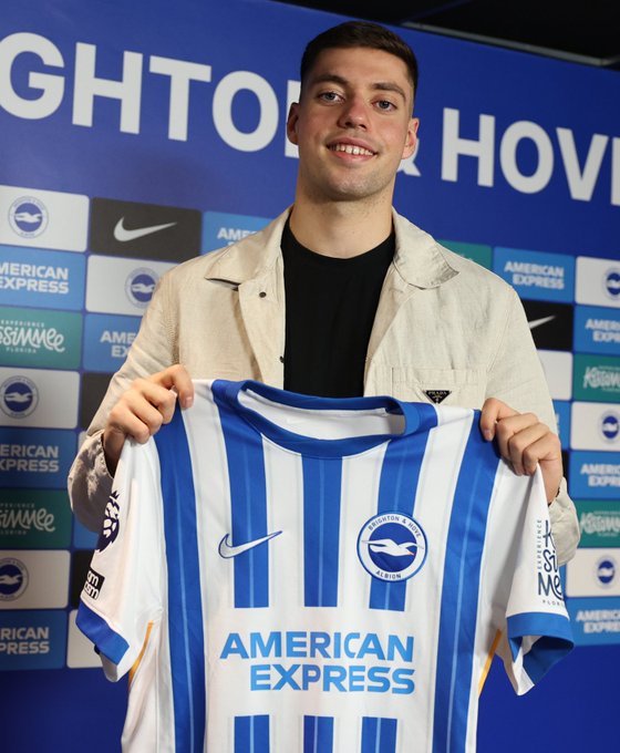 Stefanos holding up an Albion shirt after signing for the club. Great to have him here!