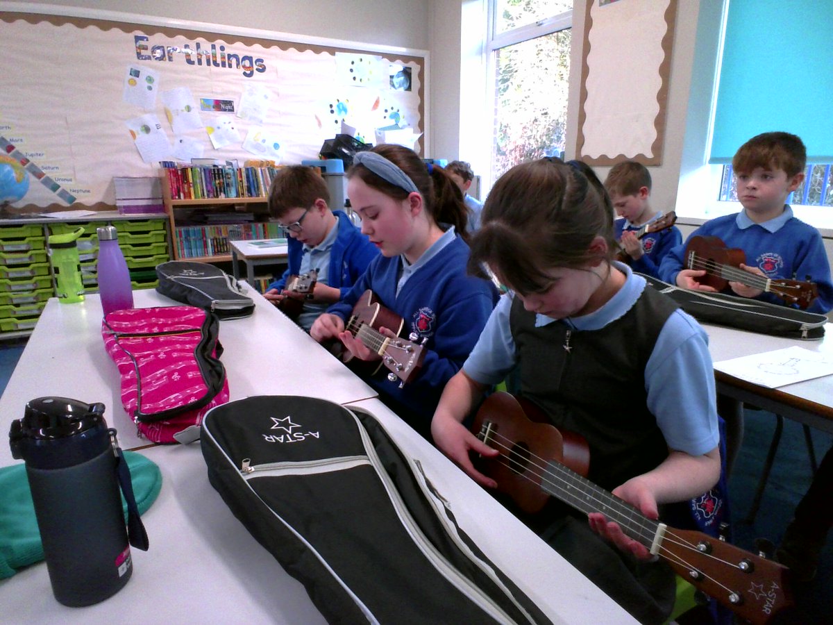AppleySaintsCE's tweet photo. #ABASY5 have been learning the ukulele. They have learnt two chords so far - C major and F major! #abasmus @charangaschool @ShevCommunity @WN6_Mums https://t.co/lTgT7ZVz89