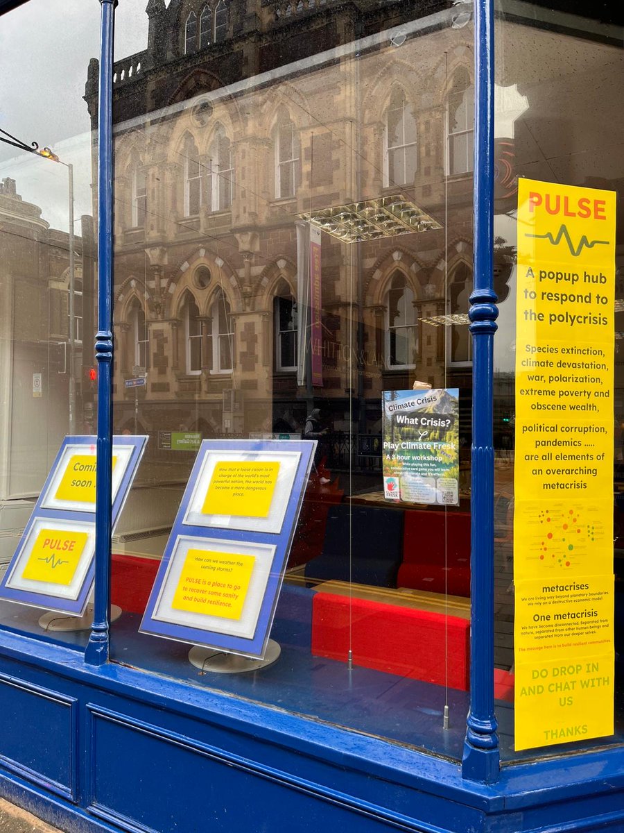 XRExeter's tweet photo. Pop-up Pulse is now open. Drop in for a chat about the poly crisis (climate, cost of living, political etc) Find us at 20 Queen Street, Exeter opposite the Museum https://t.co/u9vJ2yCzlp