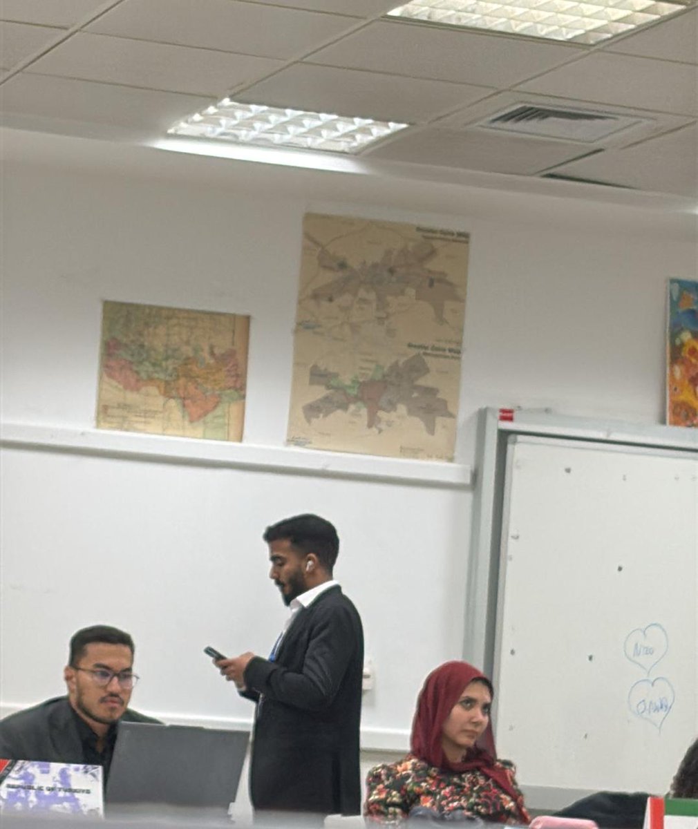 The CNN News agent displays neglect toward their own agency nametag and listens to music during crucial statements made in the session. #SC <a href="/nimunpress/">NIMUN PRESS</a>